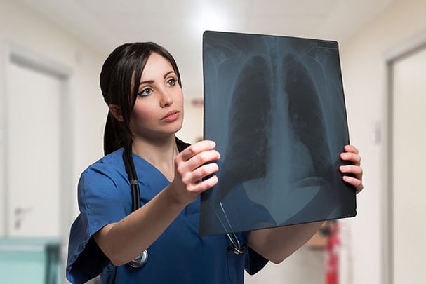 bigstock-Nurse-looking-at-a-lung-radiog-111341492.jpg