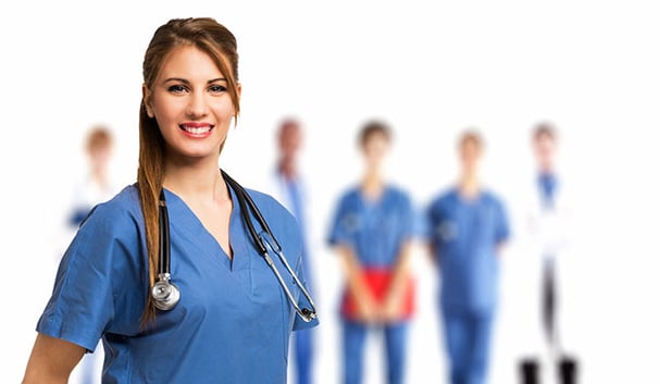 smiling-nurse-in-front-of-her-team-advance-athenacareeracademy.jpg
